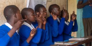 Pupils practise Kenyan Sign Language