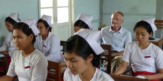 VSO volunteer Phil Heywood observing training of midwives in Myanmar