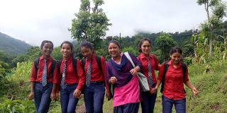 Rachana Batha Rachana Batha, a 'Big Sister' on VSO's Sisters for Sisters' Education in Nepal project, with some of the girls she is helping to keep in school