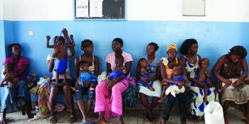 Mothers with their babies waiting at a clinic in Sierra Leone | VSO