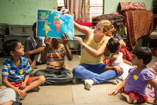 IBM corporate volunteer with children at a school in India