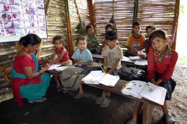 Children during a lesson in a Temporary Learning Centre supported by VSO in Lamjung district, Nepal.