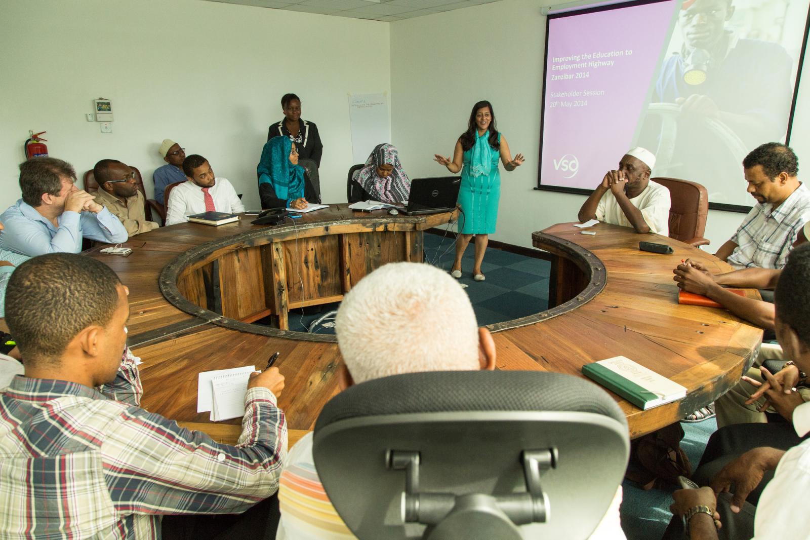 Here she is supervising a presentation and breakout sessions for stakeholder SMEs in Zanzibar.