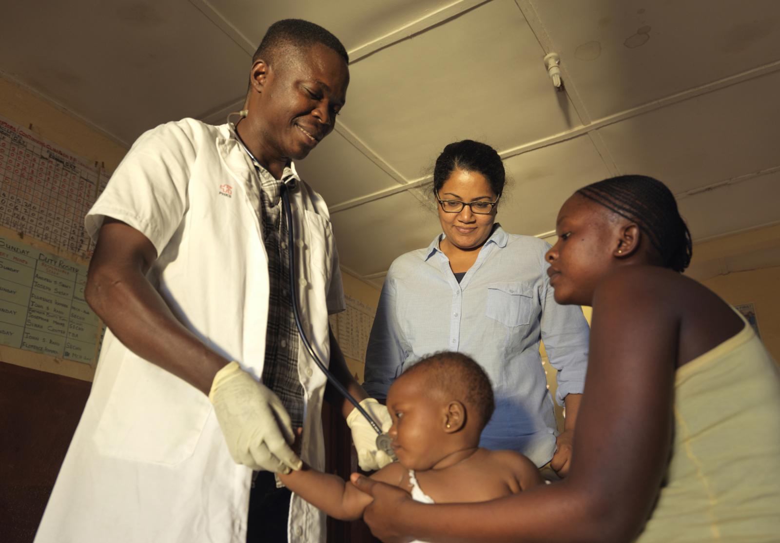 Community Health Officer Andrew with Dr Padma.