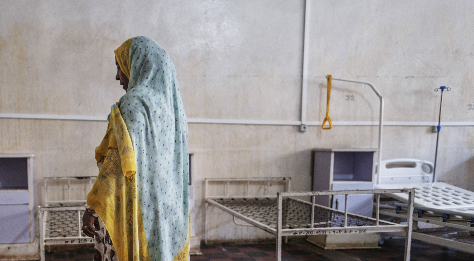 Woman inside Tigray hospital, empty of equipment