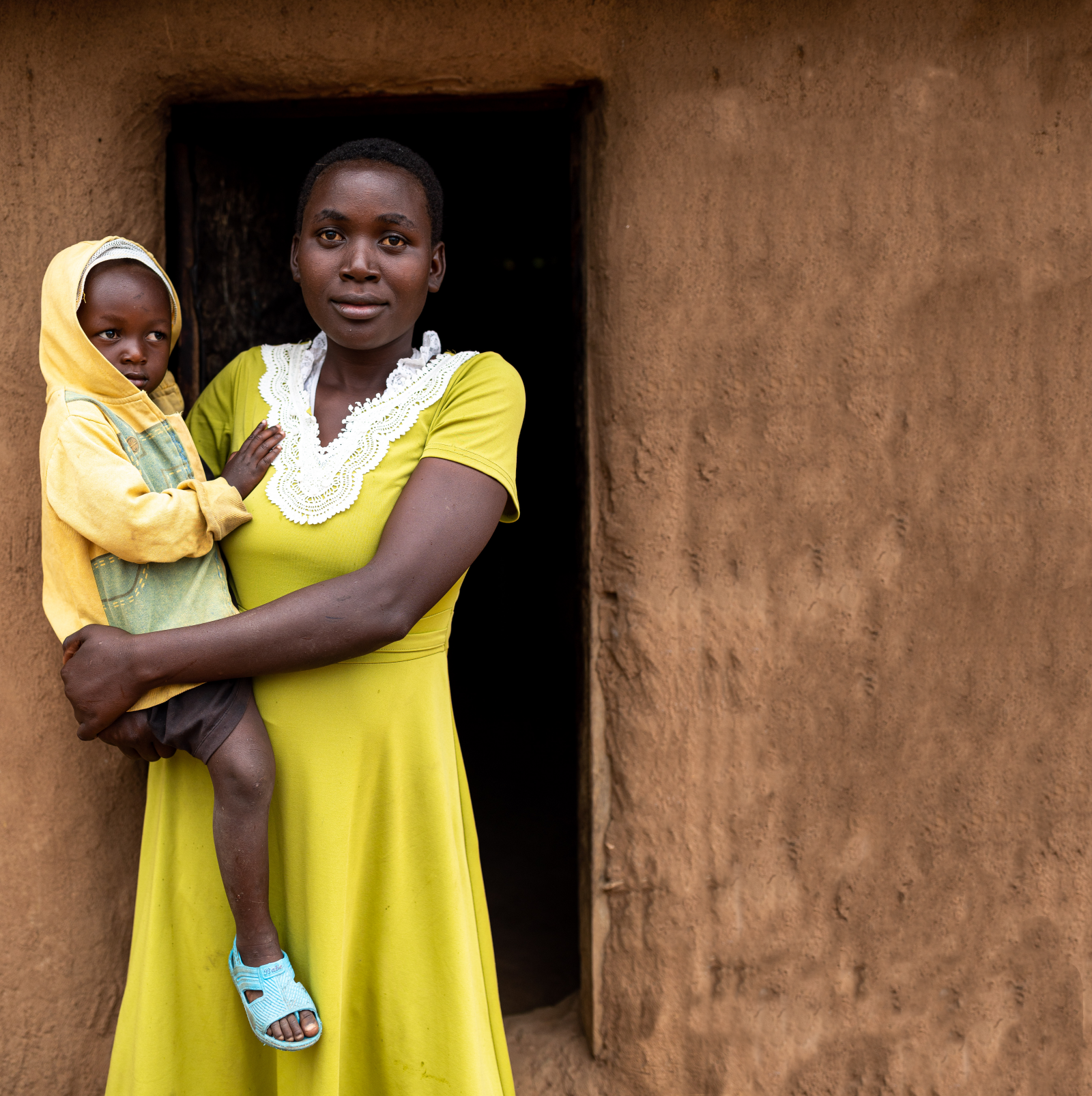Consolata holding her baby