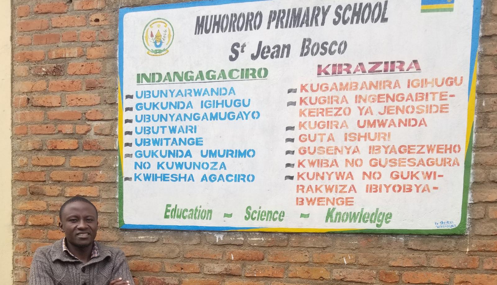 Dennis outside primary school