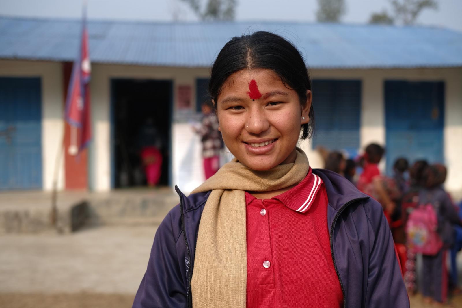 Nepalese girl outside of school