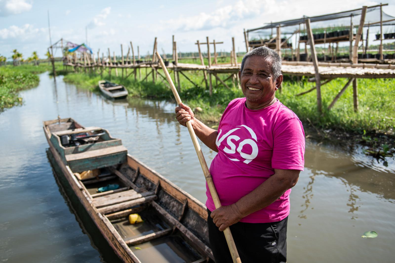 Man in VSO t shirt in boat