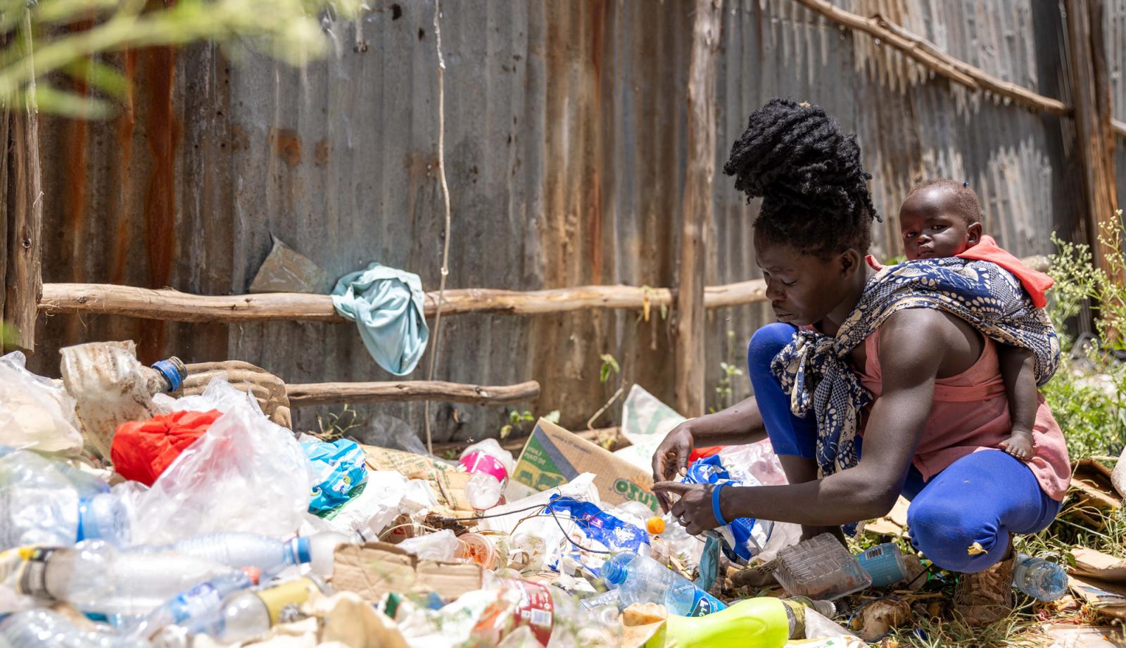 Doreen, waste picker, outside of her house