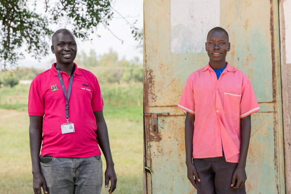 VSO volunteer Alfred and student Patrick.