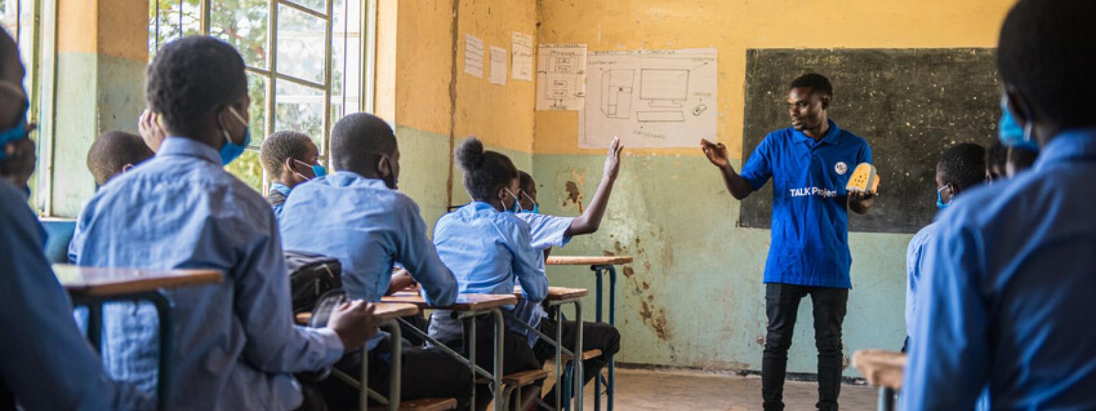 Teacher teaching school kids