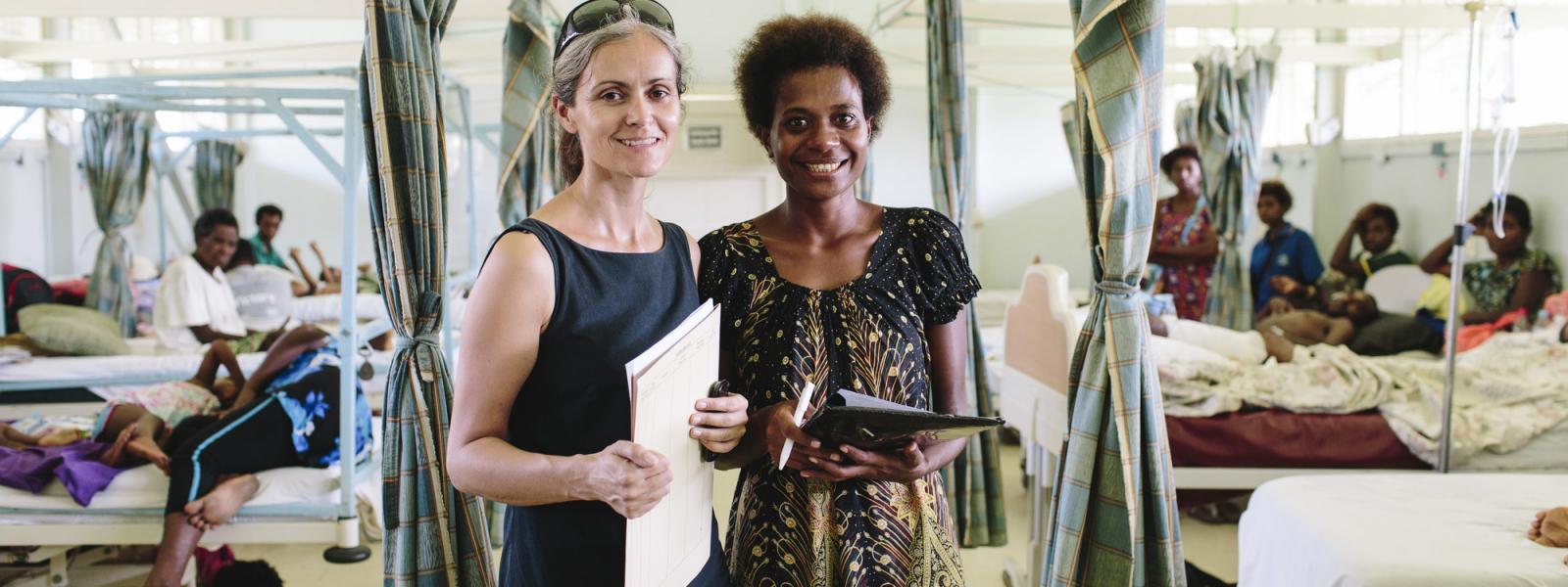 Social worker Robin Borausiki with her colleague Catherine Bedford at Modilon Hospital in Madang, Papua New Guinea. VSO volunteer Catherine Bedford is a Family and Sexual Violence Mental Health Nurse. 