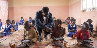 Volunteer Teonas Kalumika at an Unlocking Talent classroom in Malawi