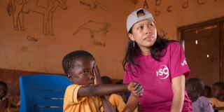 Volunteer in Ghana. Education volunteer Mary Carnable at a school, supporting wo