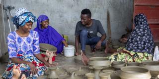 Youth volunteers in Tanzania. ICS volunteers have been working to support Tunavvwza pottery group for women with disabilities, Stone Town, Zanzibar.
