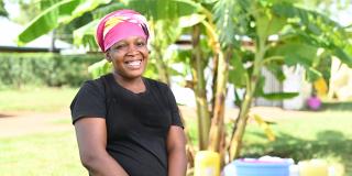 Leila smiling in her village, Kenya