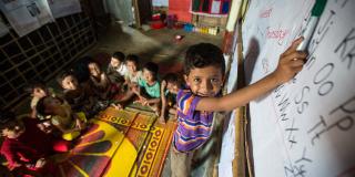 Rohingya children in refugee camp classroom