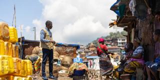 Sam with community members of Susan's Bay slum in Freetown