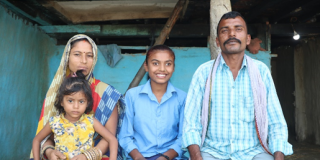 Nisha, a young girl with a disability, and her family