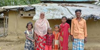 Farmer with her husband and four children