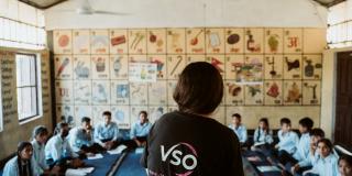 Volunteer in Nepal teaching a class