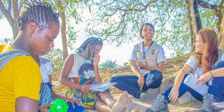 Group of girls learning outdoors