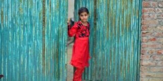 Nazia in the doorway