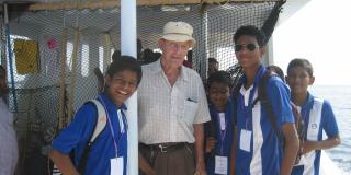 Geoffrey on a boat with some students in the Maldives