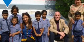VSO Volunteer Bill Carr with children and colleague in Pakistan VSO Volunteer Bill Carr with children and colleague in Pakistan
