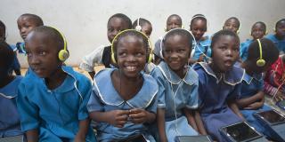 Standard-two pupils, Juliet Chisi, left, Lezina Gamaliel, Jessie Mbewe and Gloria Mphalo smile during the Unlocking Talent Through Technology class session at Ngwenya Primary School in Lilongwe Urban District Education Office