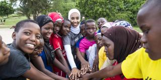 VSO ICS volunteer and qualified basketball coach Asma Elbadawi during an evening training session with male and female students from Lindi secondary school. Part of the VSO / ICS Elimu Fursa project