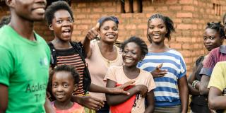 A group of people smiling at the camera