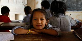 Girl in a classroom in Nepal | VSO