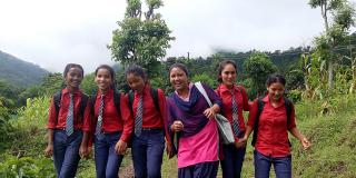 Rachana Batha, a 'Big Sister' on VSO's Sisters for Sisters' Education in Nepal project, with some of the girls she is helping to keep in school
