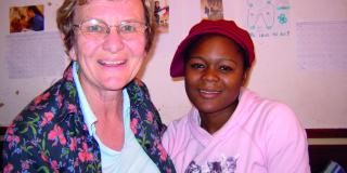 Sheila Lawrence (left) and Chrissy Zimba (right), together at a reunion in 2008 in Mzuzu, Malawi