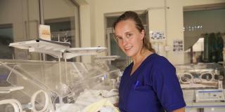 Gerieke Zandberg, paediatric nurse, is pictured with a baby. She is training other nurses in neonatal life-saving skills