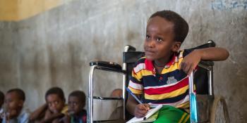 A child in a wheelchair at school