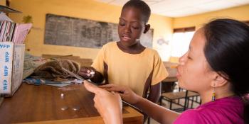 Education volunteer with seven year old Blessing, Boltanga, Ghana. Mary worked to support initiatives increasing access to education for children with disabilities in, Talensi District.