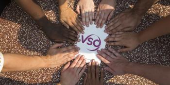 Close up of the hands of a VSO ICS team in Battambang, Cambodia