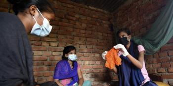 Big sister showing hygiene kit