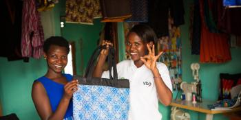 Deaf student making bags at a Deaf School vocational centre with VSO national volunteer. Rwanda