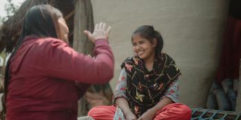Child being taught sign-language