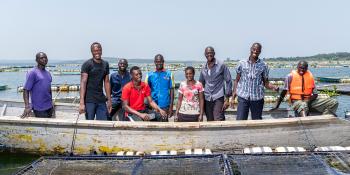 Alego Young turks members after feeding fish in their cages. Lake Zone. Tanzania