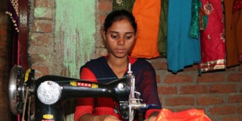 Anju at the sewing machine