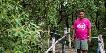 VSO Volunteer on a bridge in the Phillipines