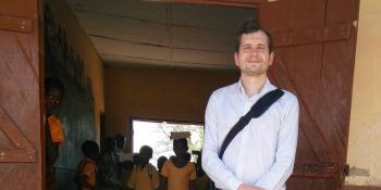 VSO volunteer Tom Legge outside a classroom in Ghana VSO volunteer Tom Legge outside a classroom in Ghana