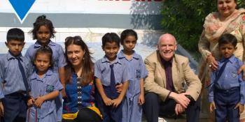 VSO Volunteer Bill Carr with children and colleague in Pakistan VSO Volunteer Bill Carr with children and colleague in Pakistan