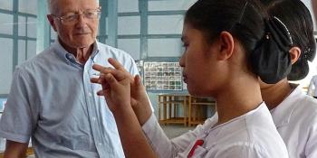 VSO health volunteer Phillip giving instruction in Myanmar VSO health volunteer Phillip giving instruction in Myanmar