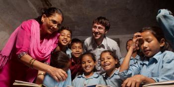 Teacher Bishnu Maya bhandrai , Prinsi, VSO volunteer Gareth and the class Teacher Bishnu Maya bhandrai , Prinsi, VSO volunteer Gareth and the class
